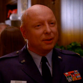 Major Garland Briggs: PATERNAL FIGURE.